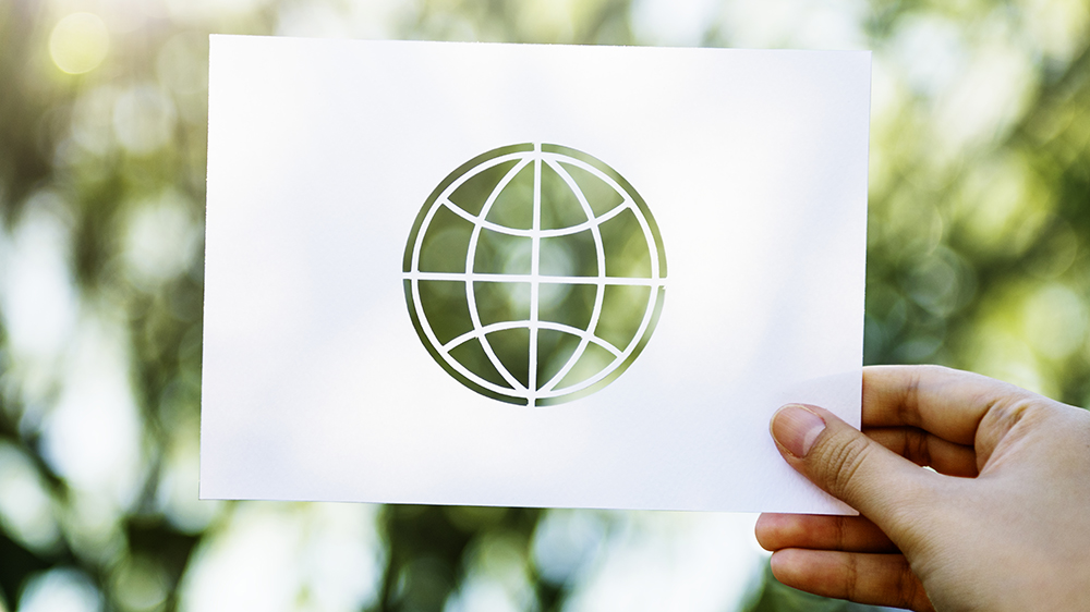 A sheet of paper with an image of the globe
